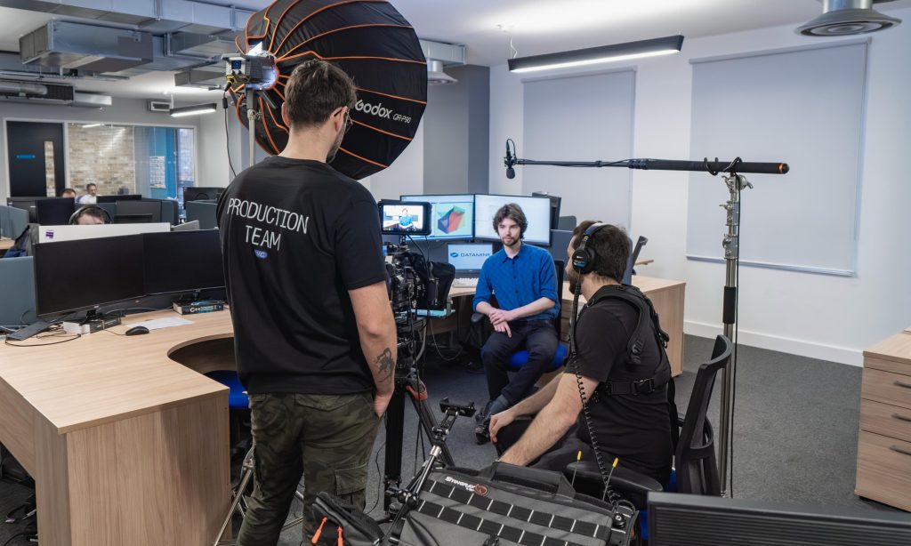 Behind-the-scenes shot from Bristol Video Co.'s video for Datamine, showing Accessible Video practises 